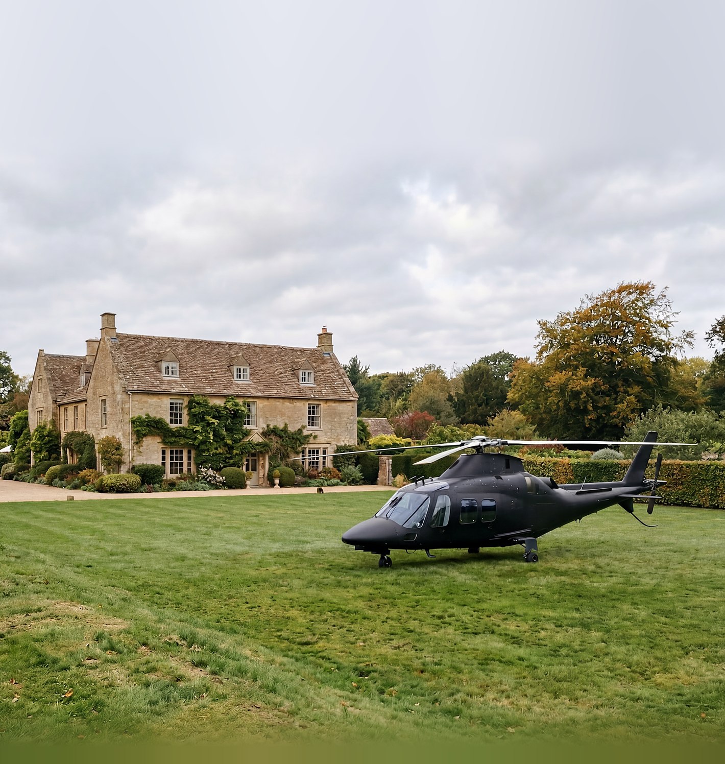 Helicopter on the lawn of a stone country house